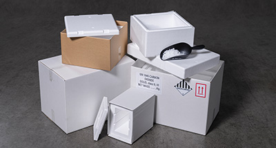 various sizes of shipping boxes stacked together with a scoop on top suitable for packing twelve items securely